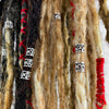 A small bead with a mantra